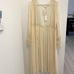 Cream colored duster with crochet detail